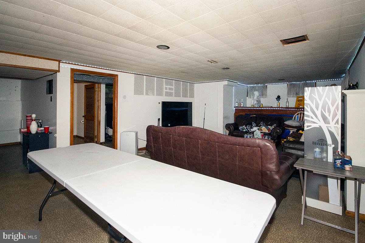 412 Swarthmore Road Glassboro, NJ 08028 - Photo 38 of 50 a large bedroom with bed and a fireplace