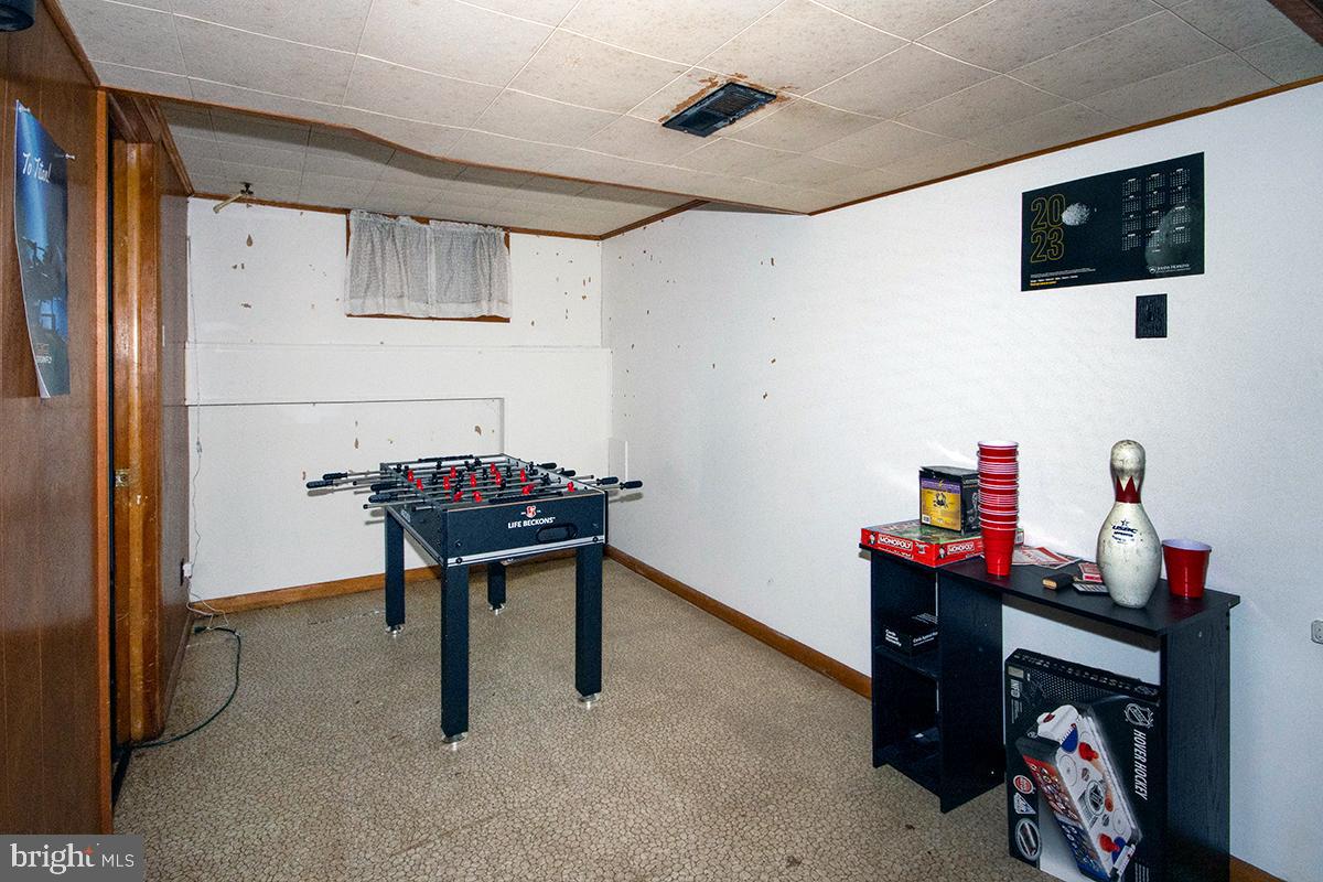 412 Swarthmore Road Glassboro, NJ 08028 - Photo 40 of 50 a room with furniture and a flat screen tv