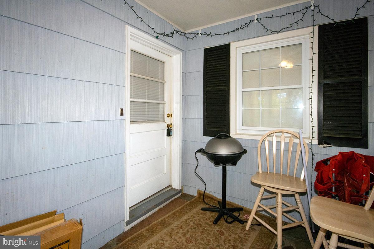 412 Swarthmore Road Glassboro, NJ 08028 - Photo 46 of 50 a view of a room with furniture and a window