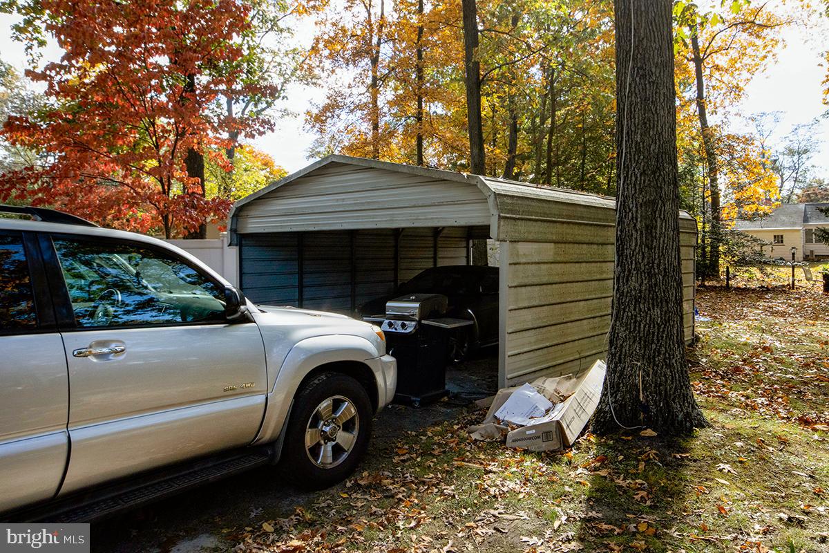 412 Swarthmore Road Glassboro, NJ 08028 - Photo 49 of 50 a front view of a house with garden