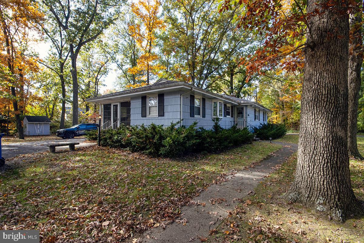 412 Swarthmore Road Glassboro, NJ 08028 - Photo 5 of 50 a view of a house with backyard and sitting area