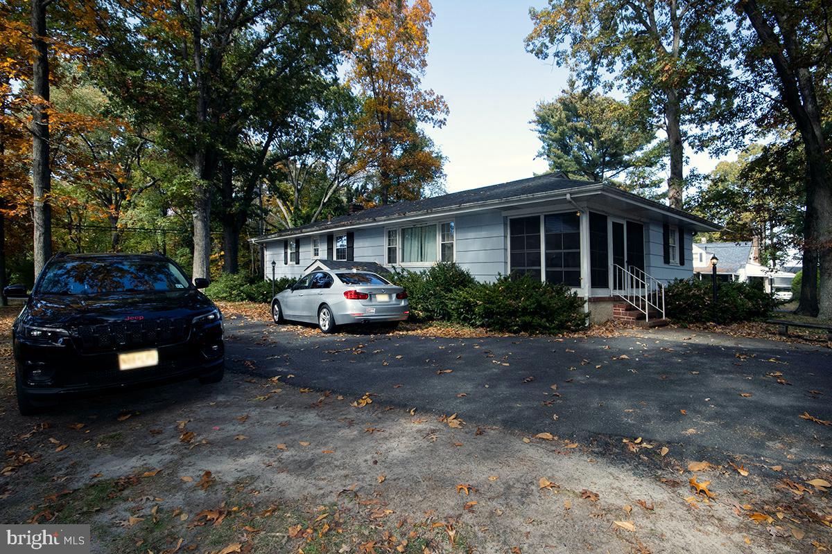 412 Swarthmore Road Glassboro, NJ 08028 - Photo 6 of 50 a view of a car parked in front of house