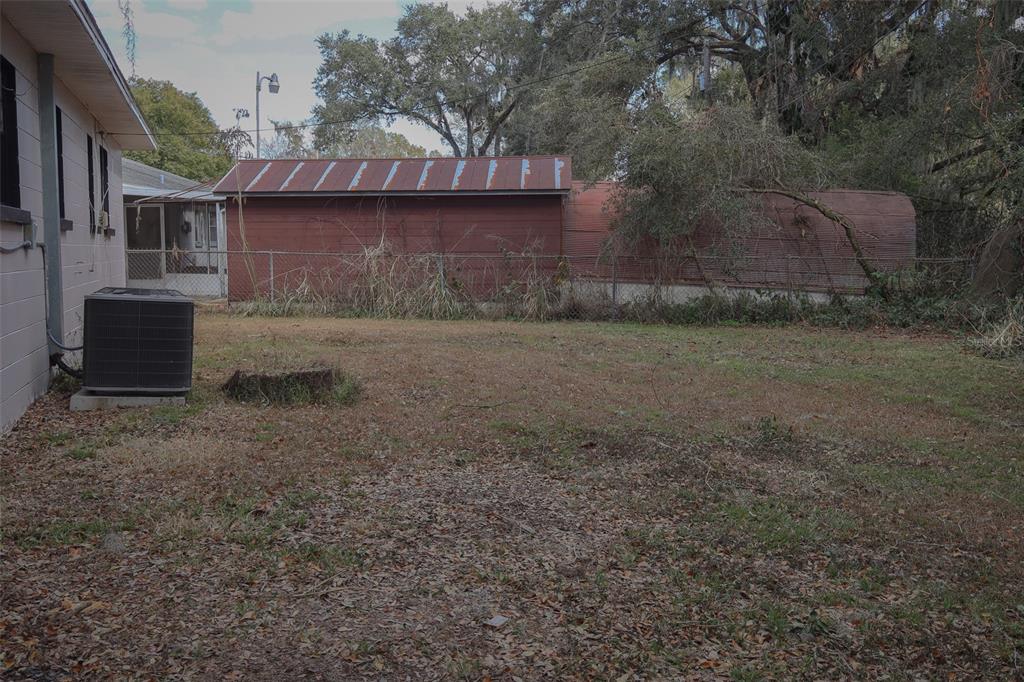 2708 Dixie Road Lakeland, FL 33801 - Photo 29 of 31 a view of a house with a yard