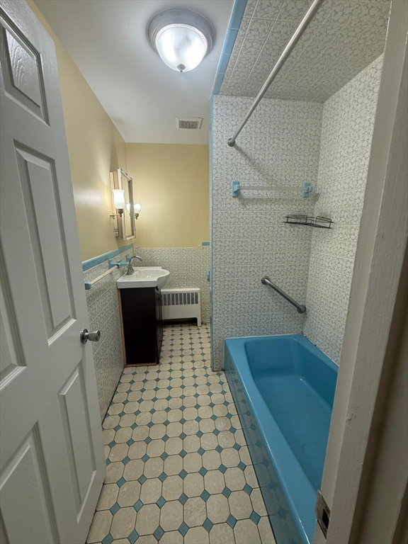 39 Alpena Avenue Dedham, MA 02026 - Photo 10 of 11 a walk in closet of a bathroom