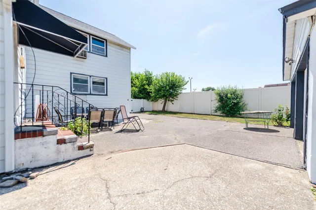 a view of a terrace with chairs