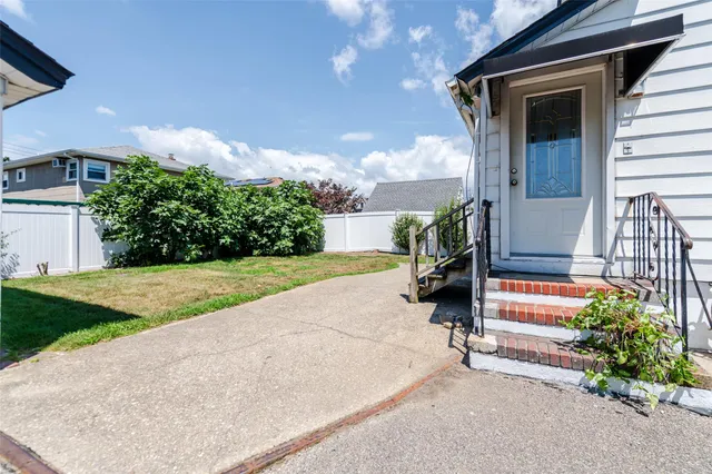 a house view with a garden space