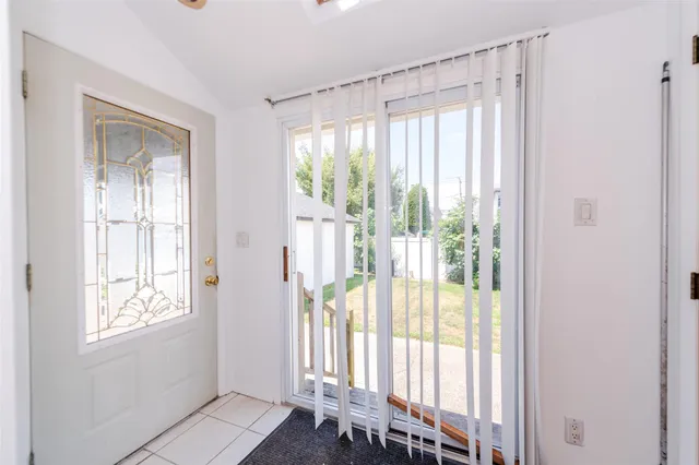 a view of a large window with wooden floor