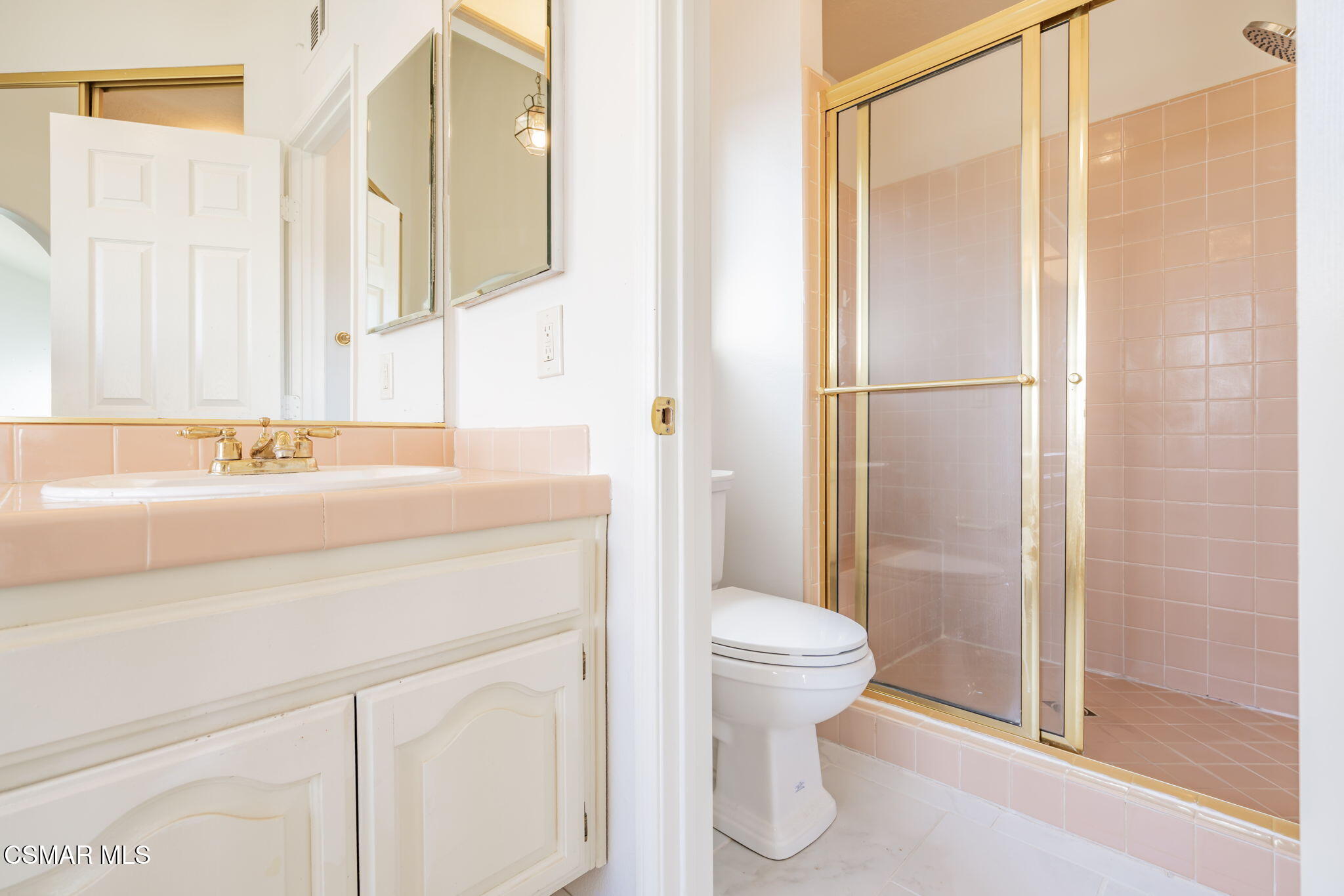 376 Fresh Meadows Road Simi Valley, CA 93065 - Photo 35 of 50 a bathroom with a sink a toilet and shower