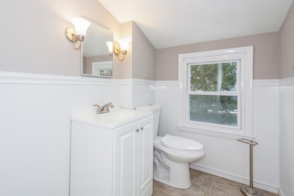 26 Kittrell Street Springfield, MA 01119 - Photo 15 of 21 a bathroom with a sink a toilet and a window