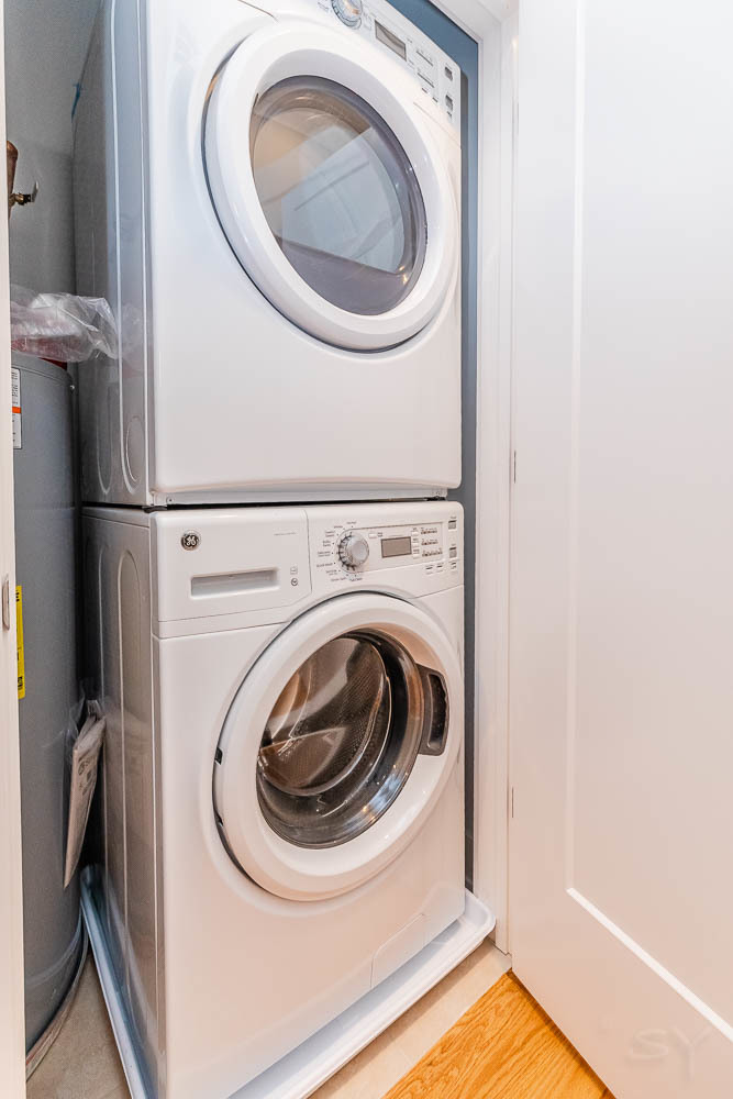 2307 West 19th Street, Unit 2 Chicago, IL 60608 - Photo 13 of 16 a utility room with dryer and washer