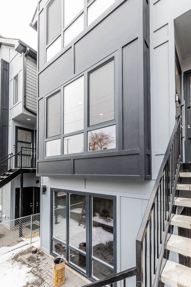 2307 West 19th Street, Unit 2 Chicago, IL 60608 - Photo 2 of 16 a view of a house with a window and brick walls