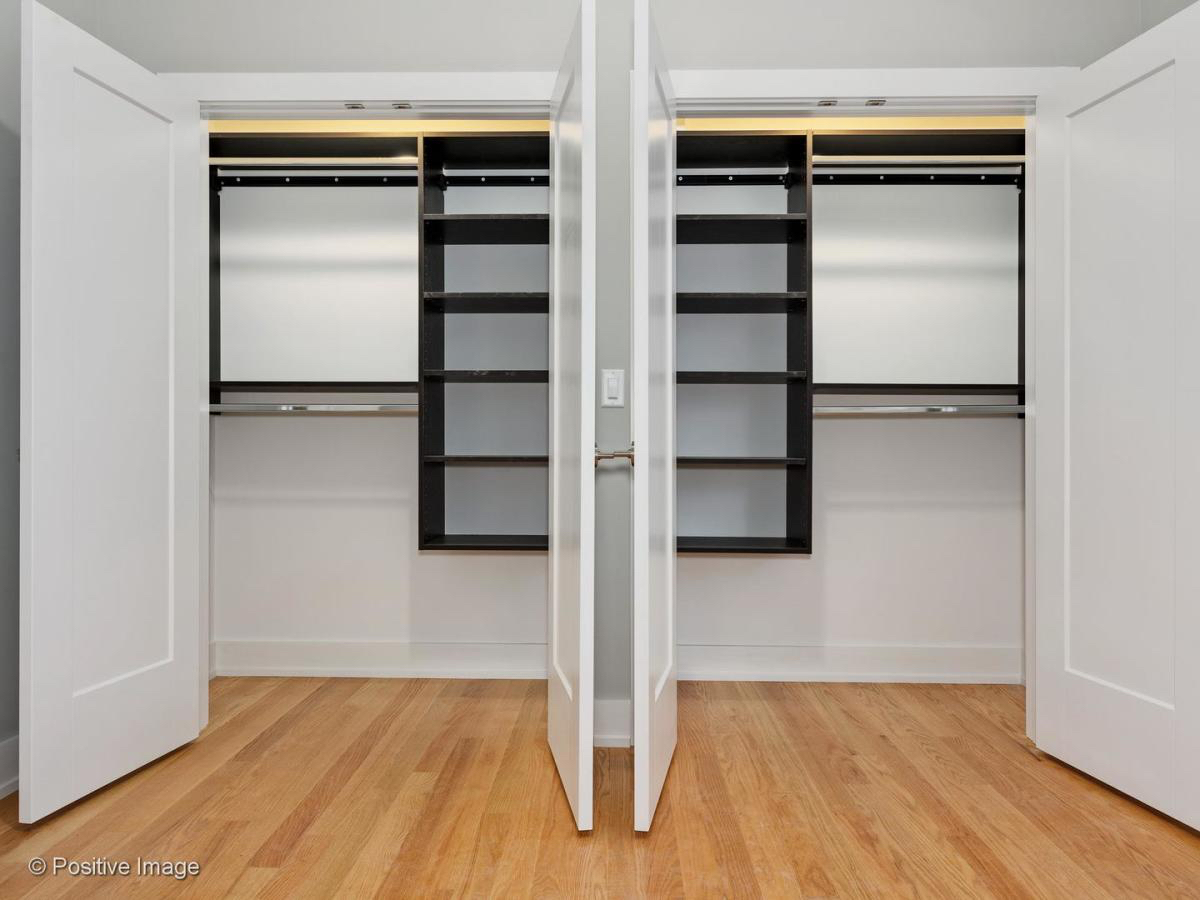 2307 West 19th Street, Unit 2 Chicago, IL 60608 - Photo 9 of 16 a view of an empty room with wooden floor