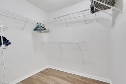 a view of a room with racks on the wall