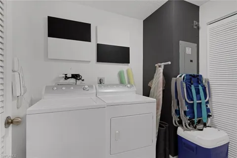 a bathroom with a sink toilet and mirror