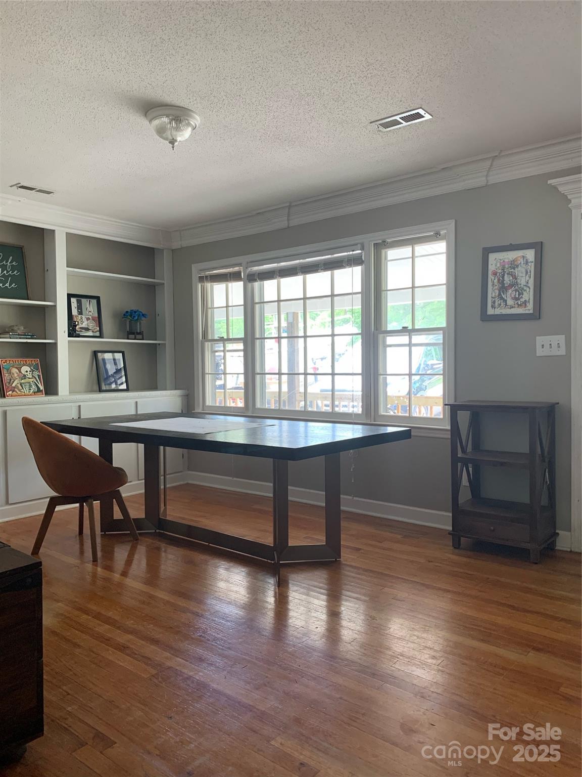 10672 Barberville Road Indian Land, SC 29707 - Photo 11 of 34 a room with furniture window and wooden floor