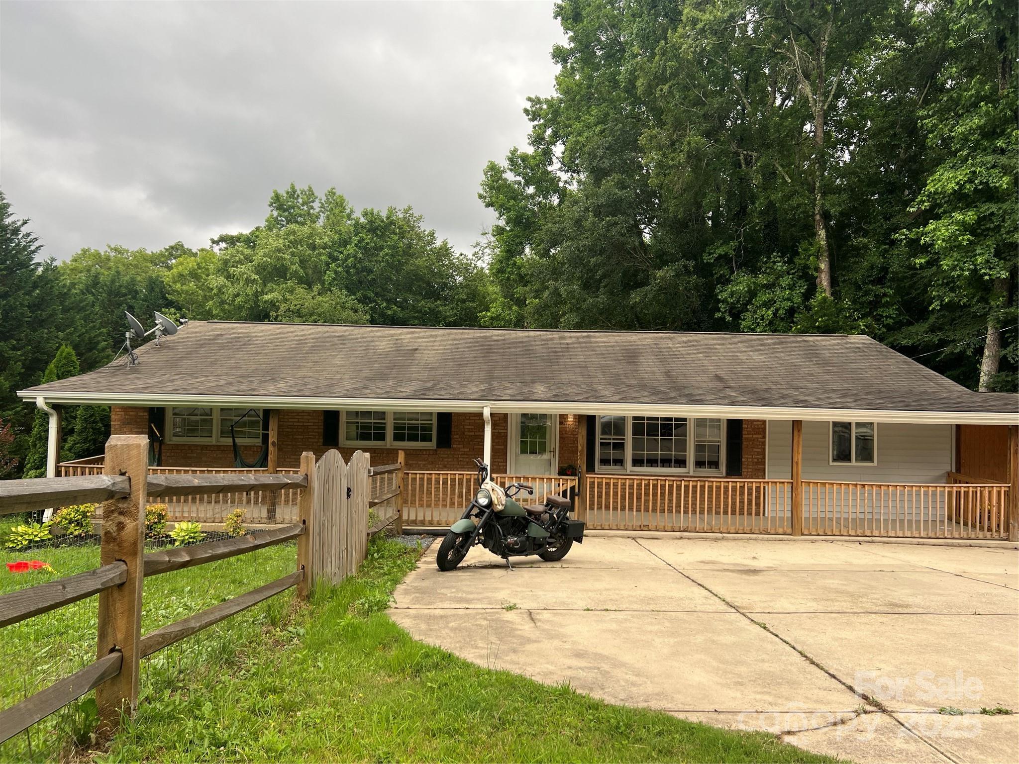 10672 Barberville Road Indian Land, SC 29707 - Photo 2 of 34 a view of a house with backyard porch and sitting area