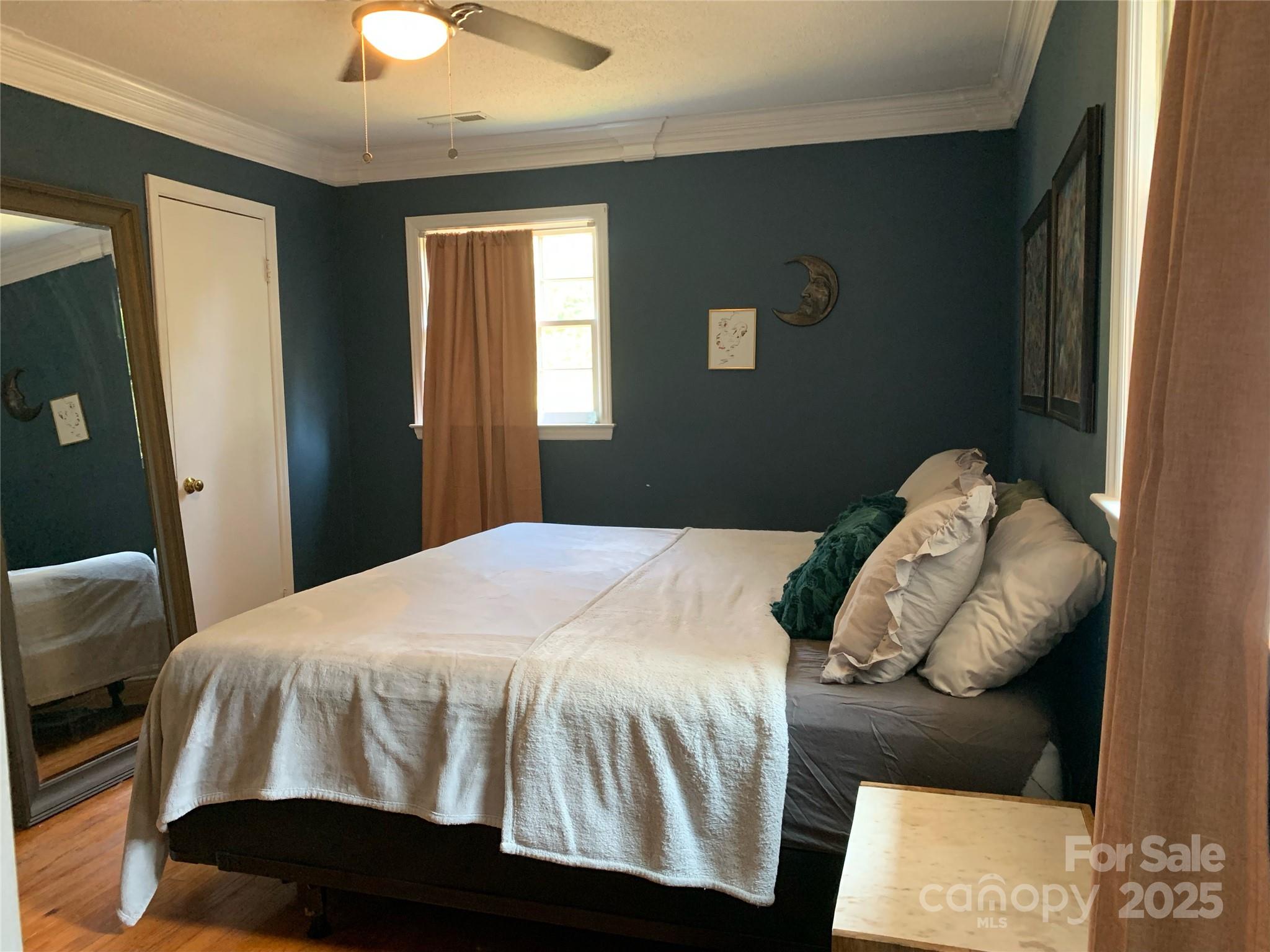 10672 Barberville Road Indian Land, SC 29707 - Photo 23 of 34 a bedroom with a bed and a window
