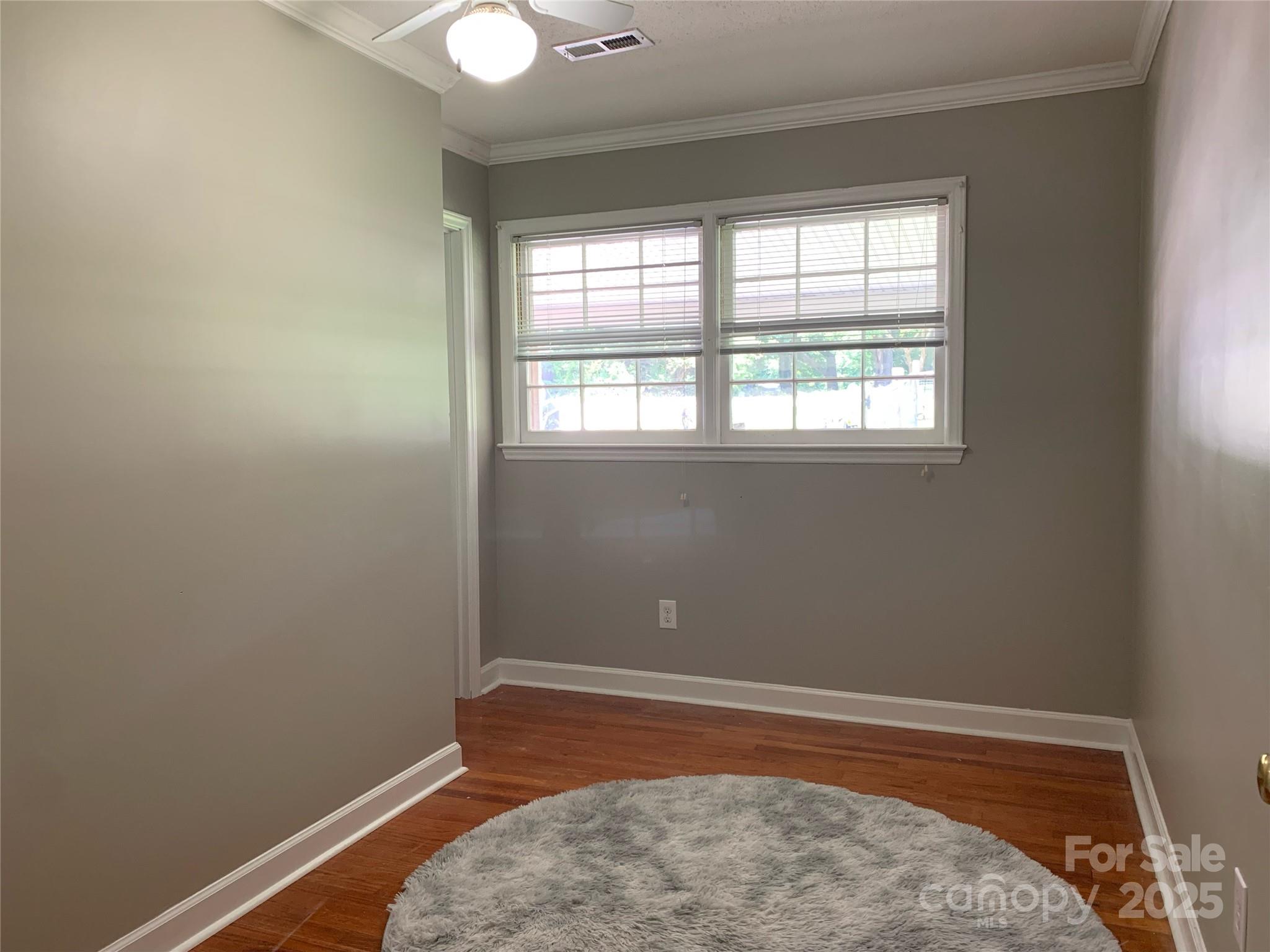 10672 Barberville Road Indian Land, SC 29707 - Photo 34 of 34 an empty room with an empty space and window