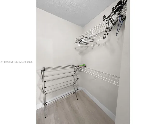 a view of a room with racks on the wall