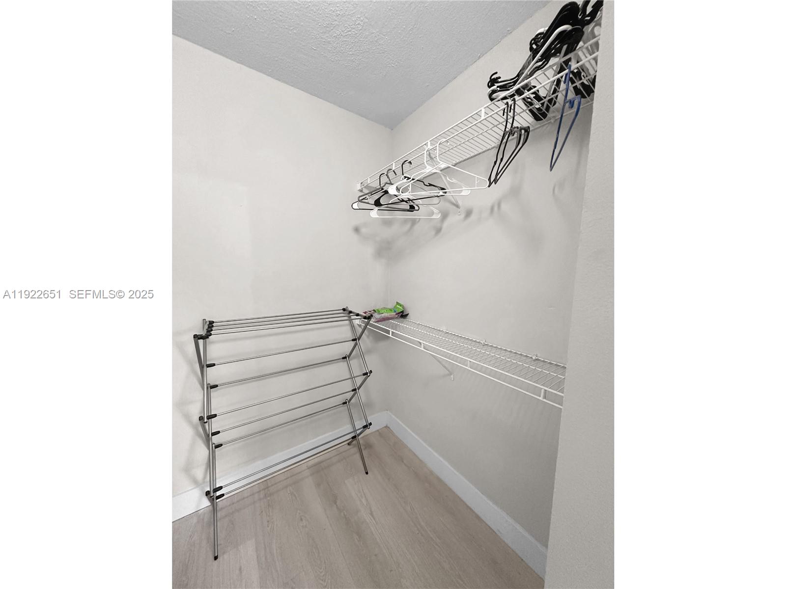 2120 West Preserve Way, Unit 301 Miramar, FL 33025 - Photo 14 of 28 a view of a room with racks on the wall