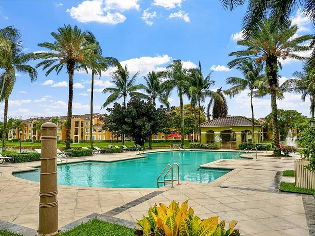 a view of an outdoor space and swimming pool