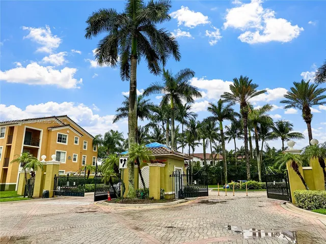 a view of a lake with a building in the background