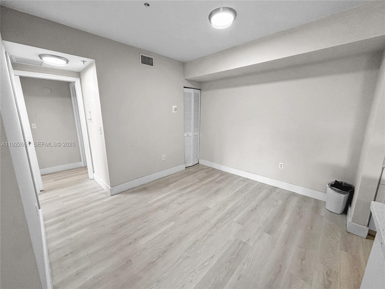 2120 West Preserve Way, Unit 301 Miramar, FL 33025 - Photo 9 of 28 wooden floor in an empty room
