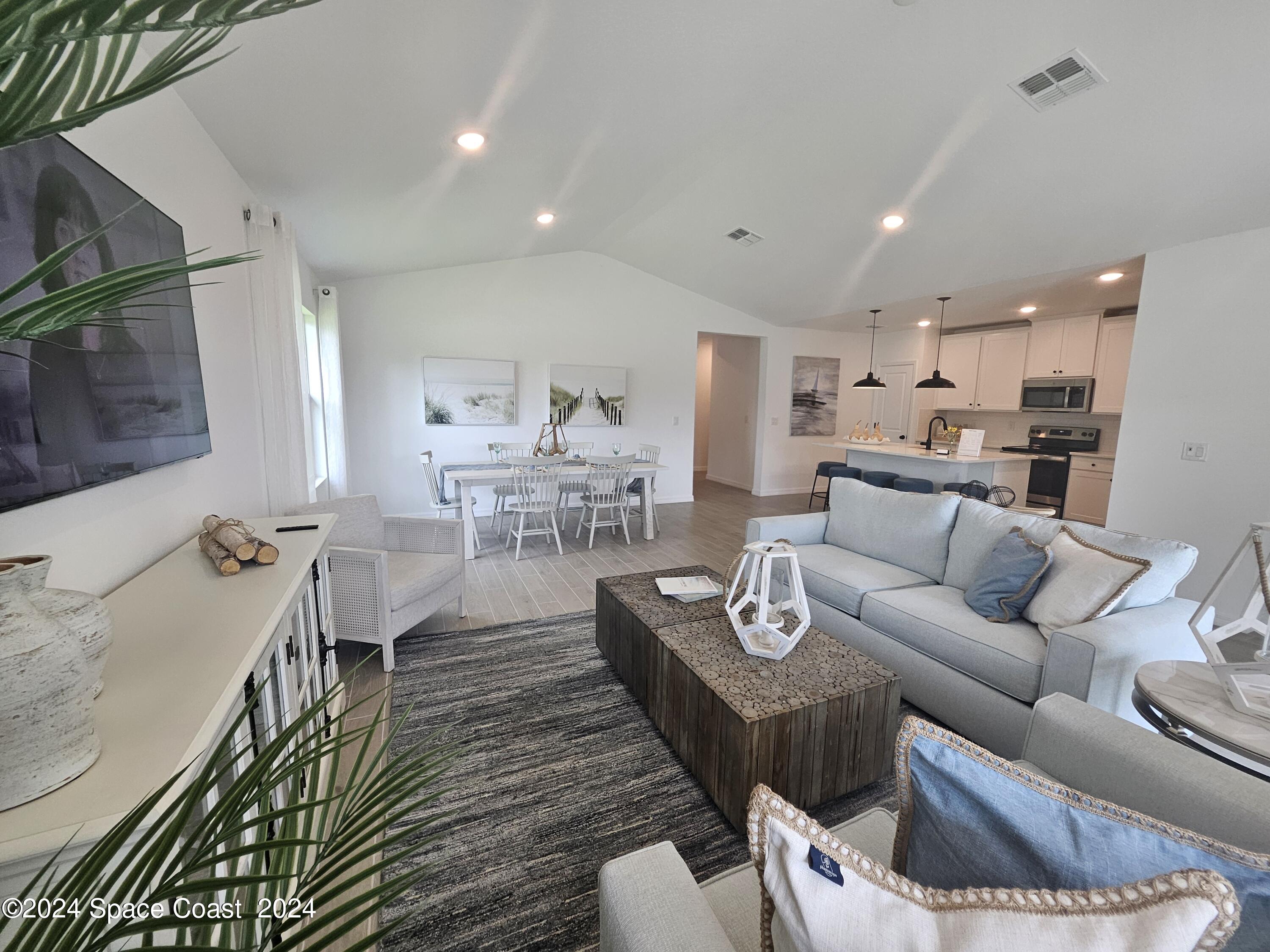 318 Olin Road Palm Bay, FL 32908 - Photo 15 of 17 Model Living Area
