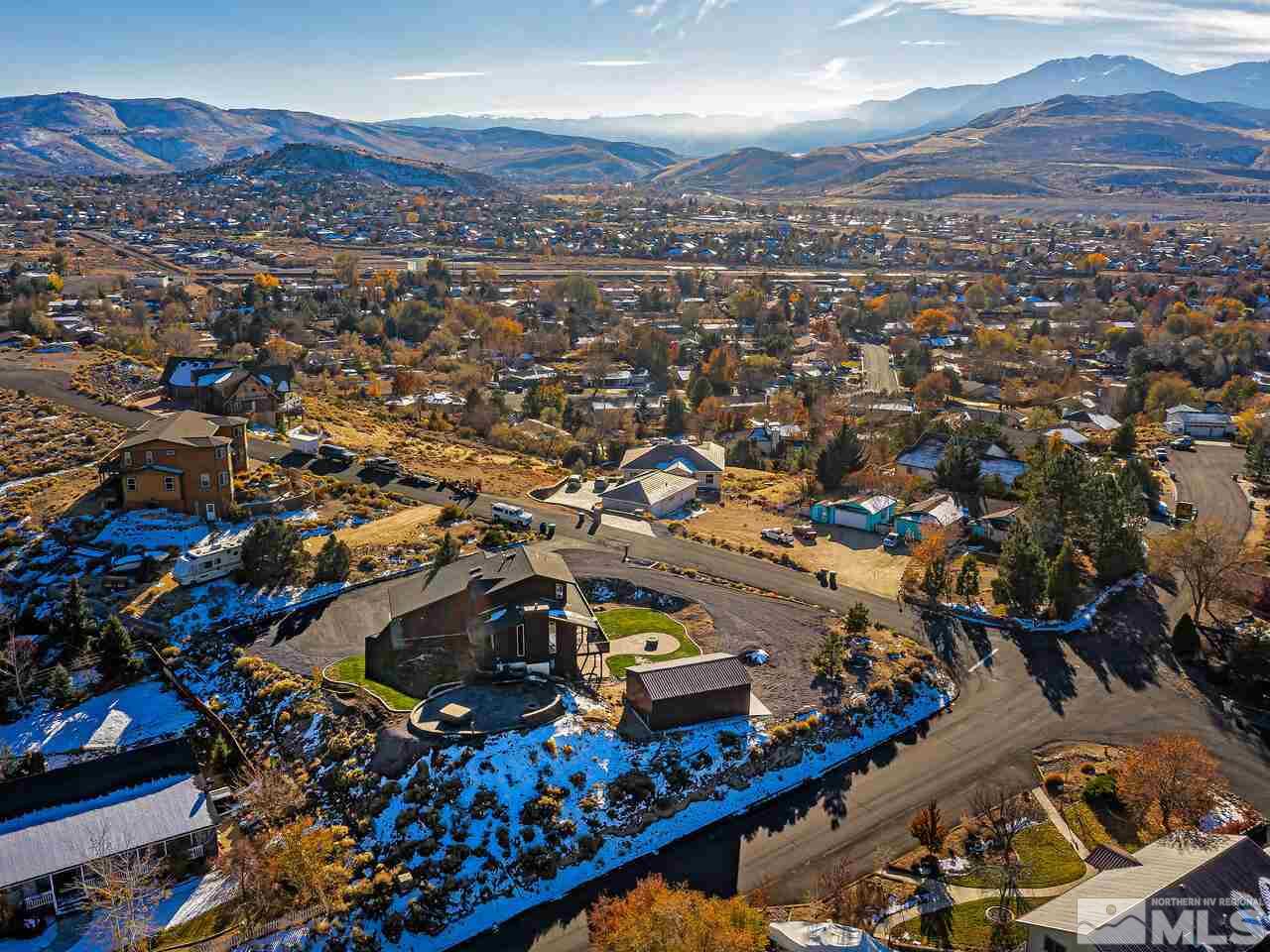 14300 Sitting Bull Circle Reno, NV 89521 - Photo 13 of 32 an aerial view of residential houses and city street