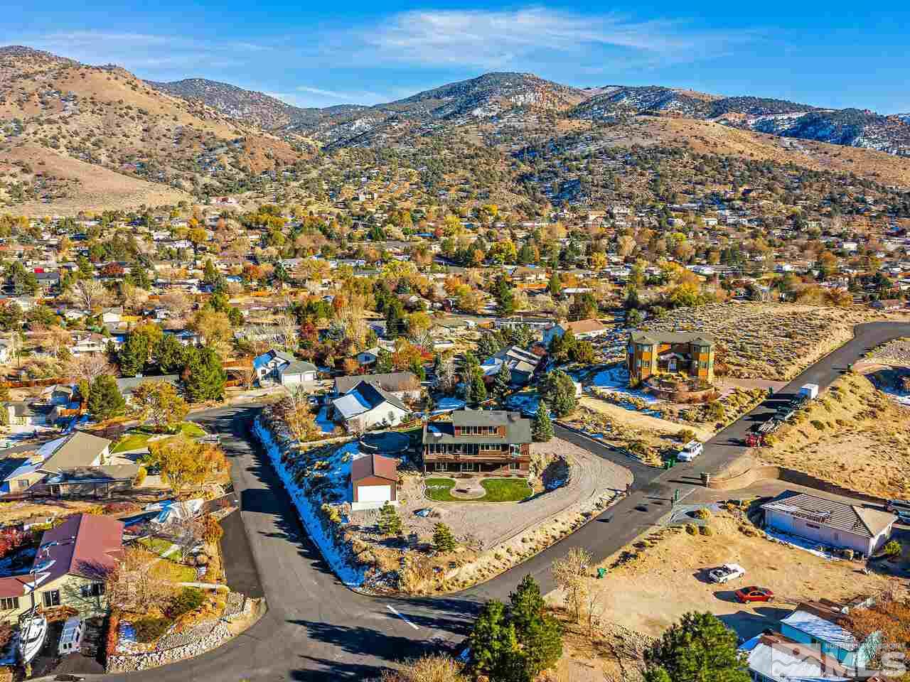 14300 Sitting Bull Circle Reno, NV 89521 - Photo 9 of 32 an aerial view of residential houses with outdoor space