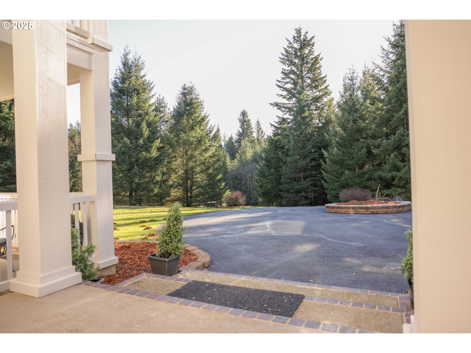 5812 Northeast Livingston Road Camas, WA 98607 - Photo 6 of 27 a view of a swimming pool with an outdoor space and seating area
