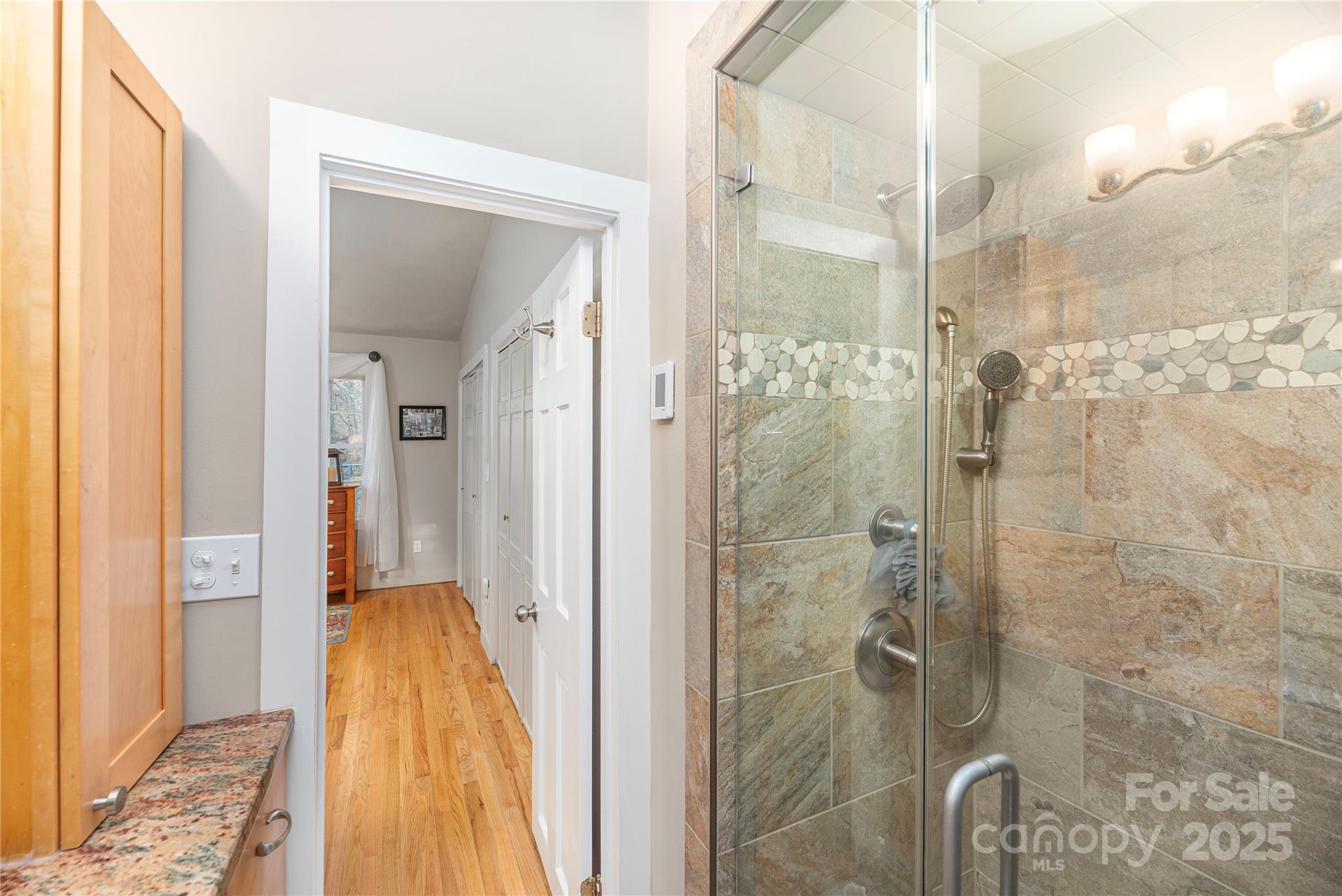106 Spooks Branch Road Asheville, NC 28804 - Photo 18 of 28 a bathroom with a shower