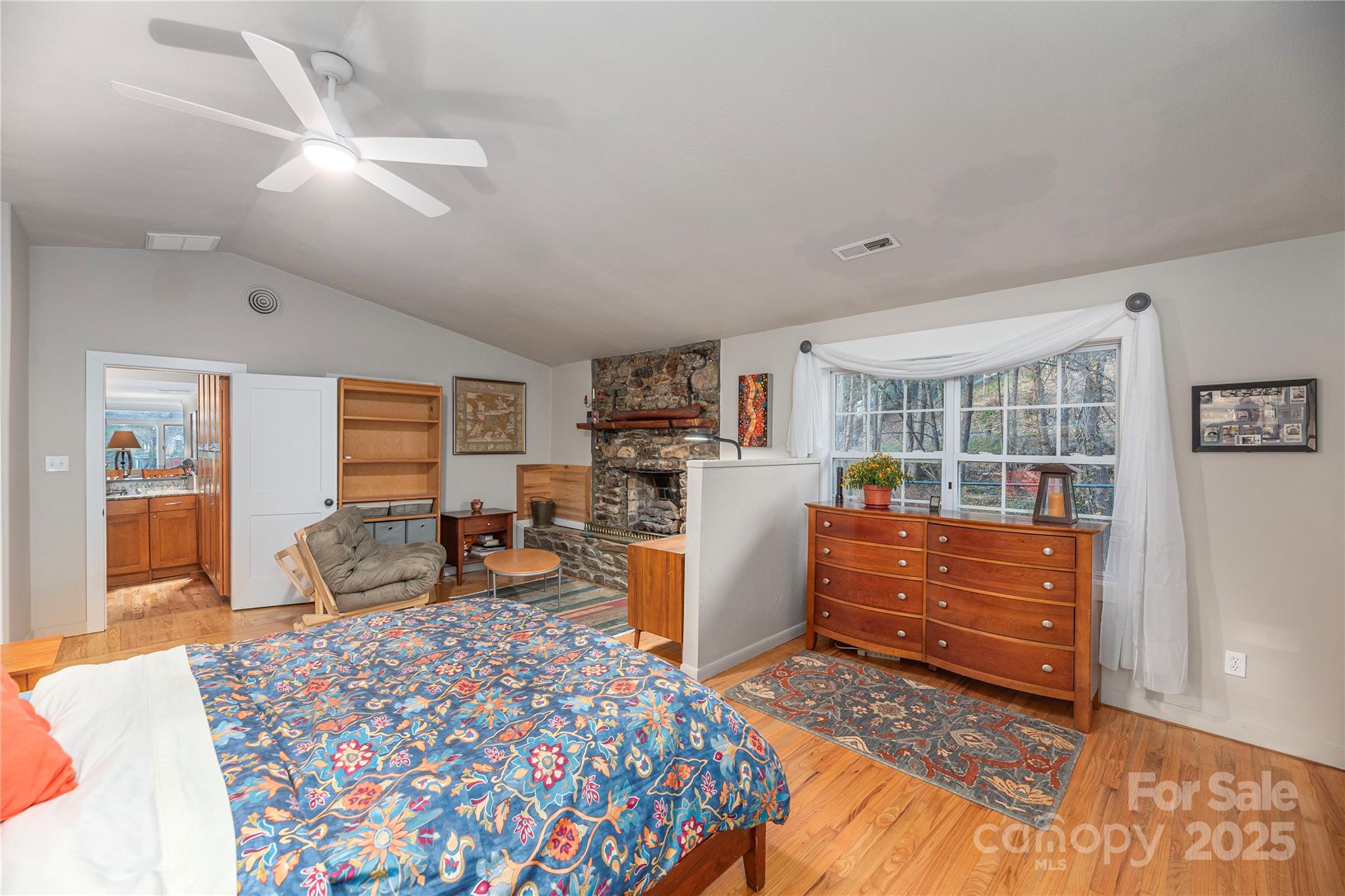 106 Spooks Branch Road Asheville, NC 28804 - Photo 19 of 28 a bedroom with furniture and a window