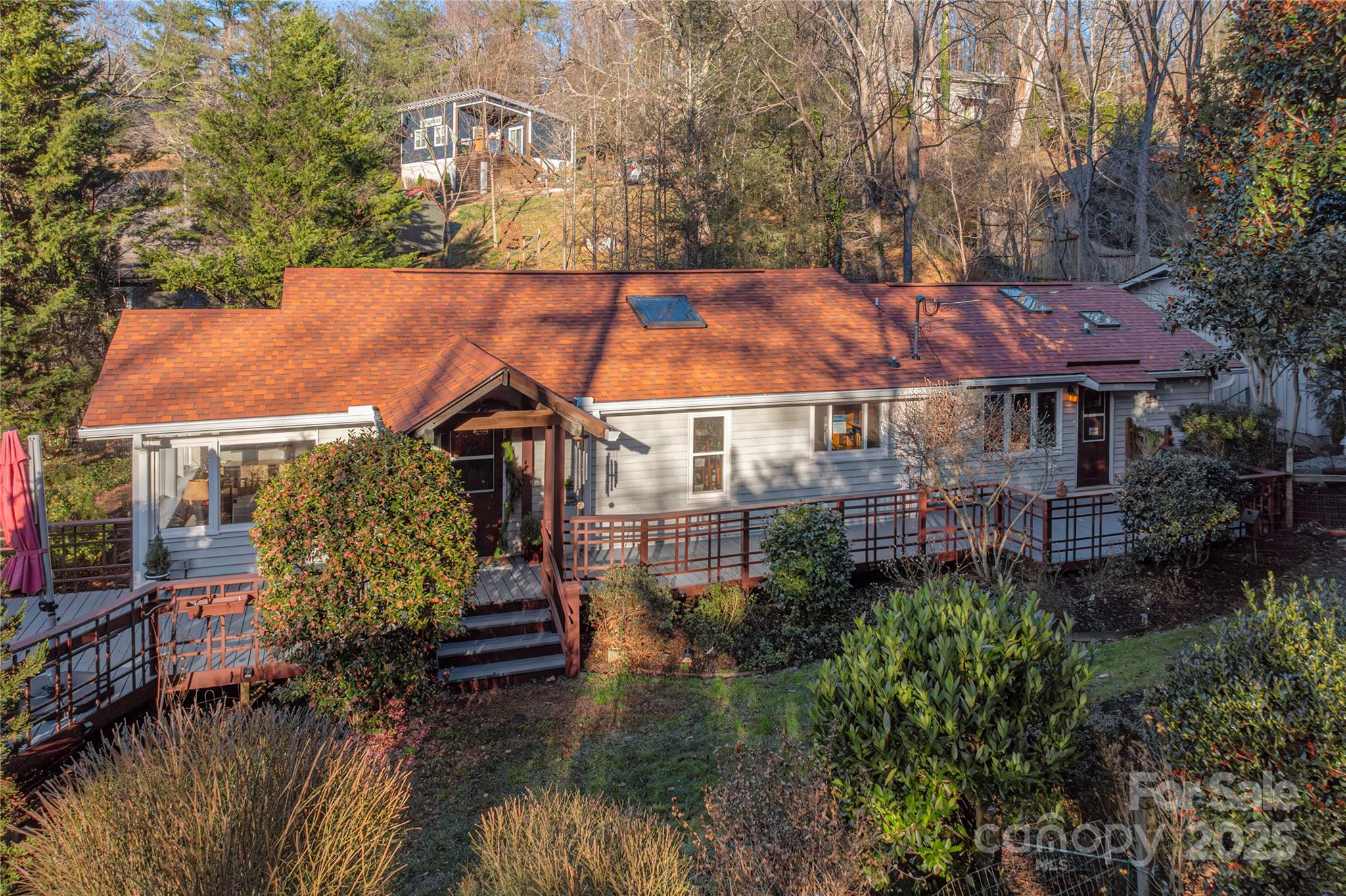 106 Spooks Branch Road Asheville, NC 28804 - Photo 2 of 28 a view of a house with a yard