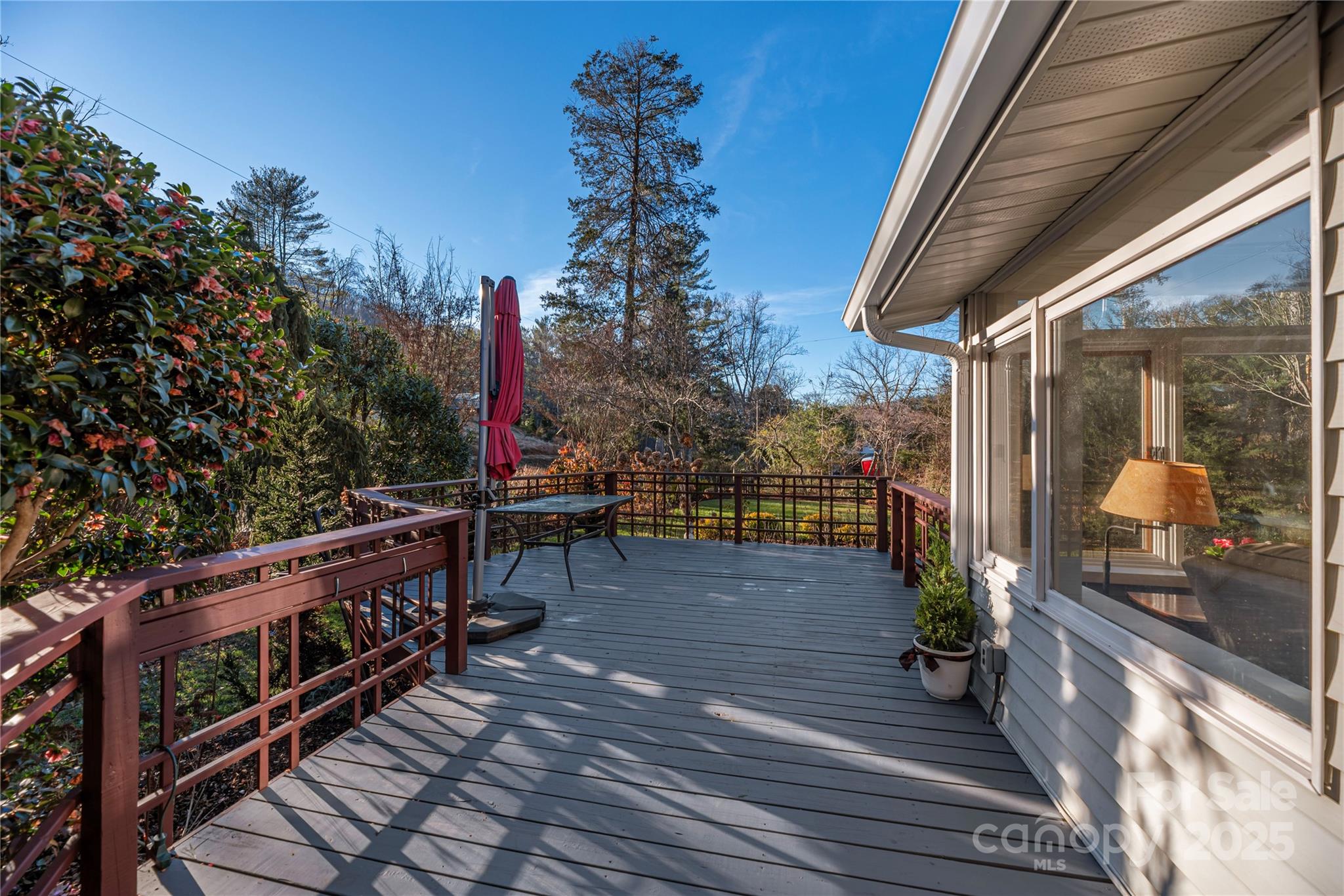 106 Spooks Branch Road Asheville, NC 28804 - Photo 24 of 28 a view of a patio with wooden floor