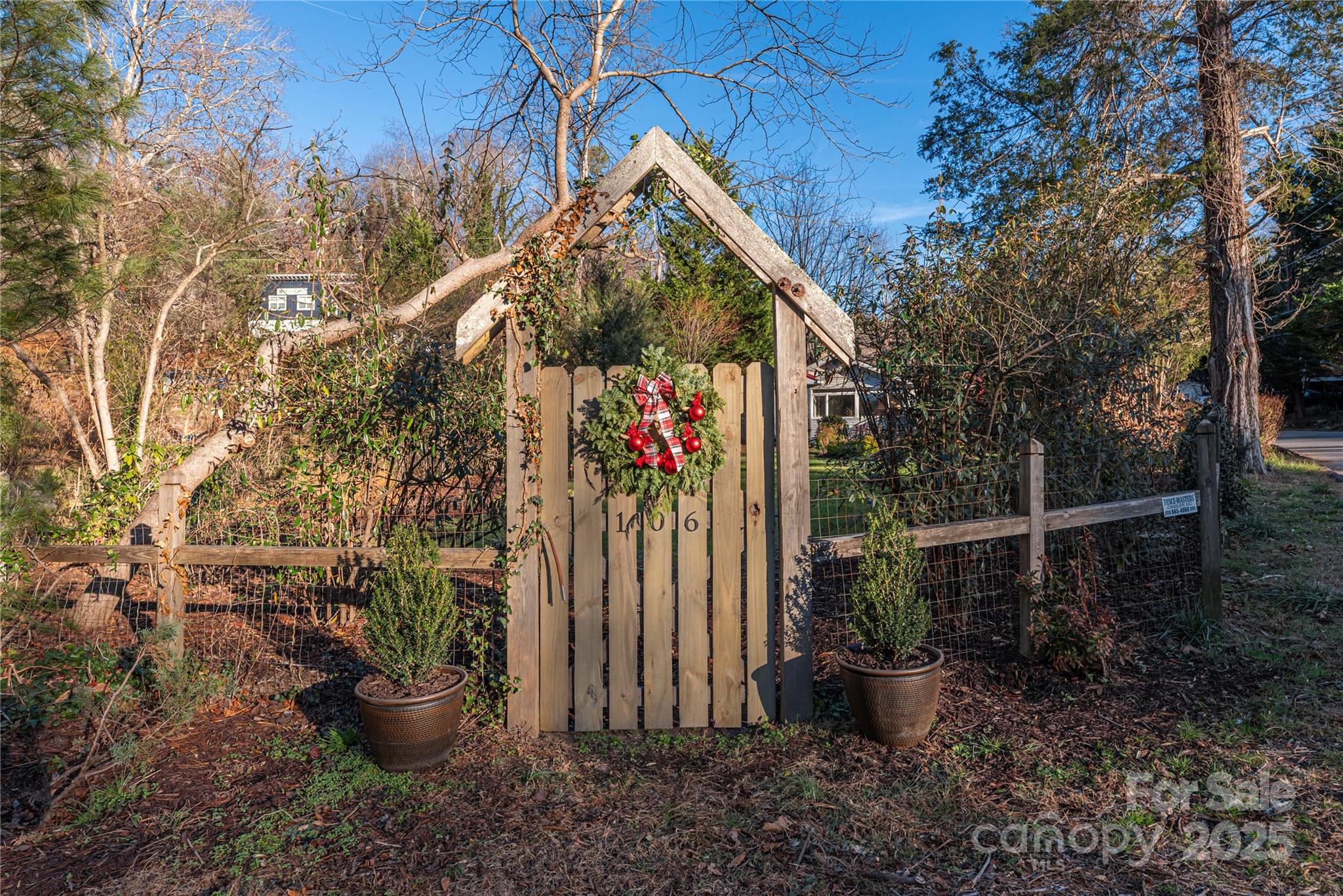 106 Spooks Branch Road Asheville, NC 28804 - Photo 27 of 28 a backyard of a house with lots of green space