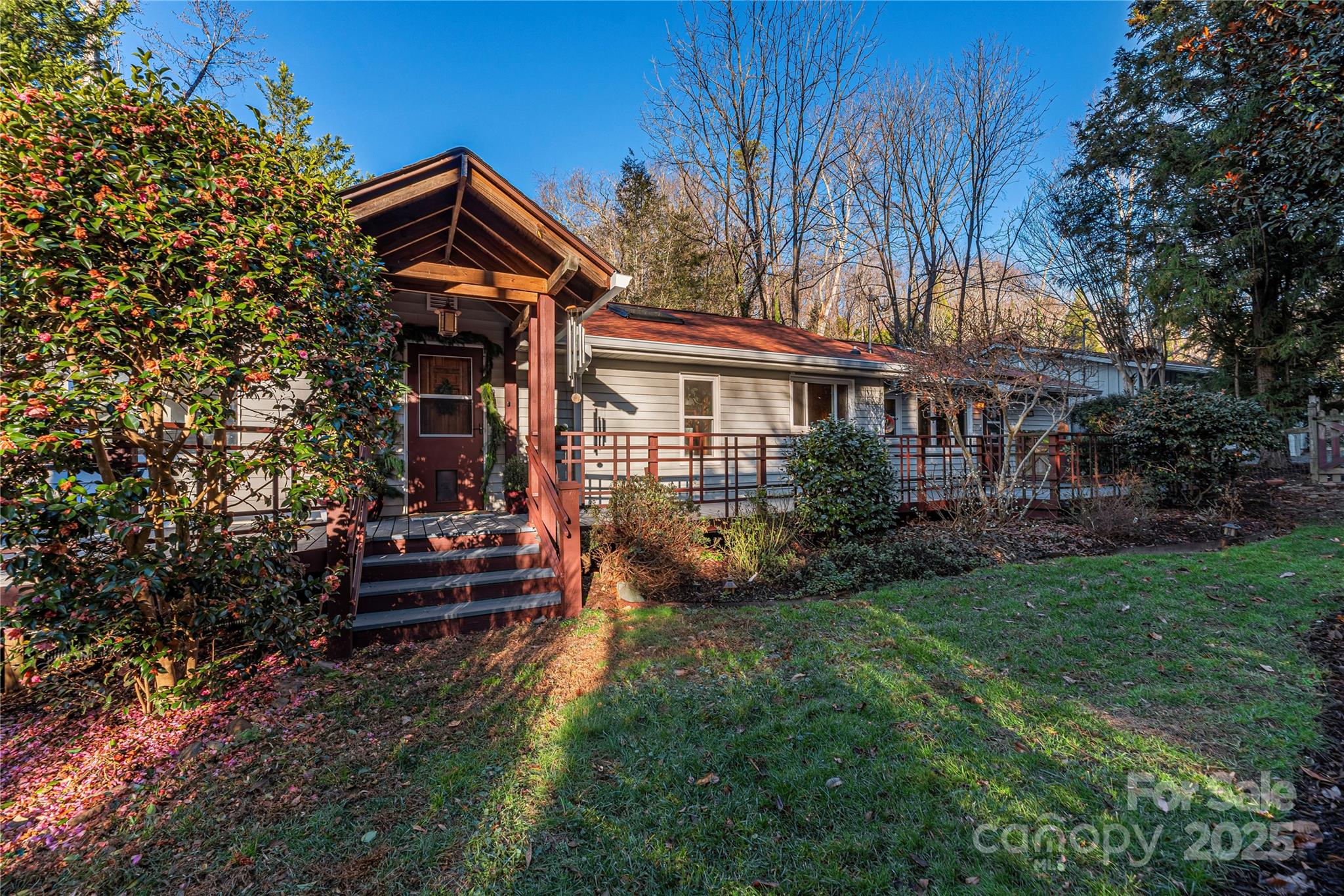 106 Spooks Branch Road Asheville, NC 28804 - Photo 3 of 28 a front view of a house with a yard