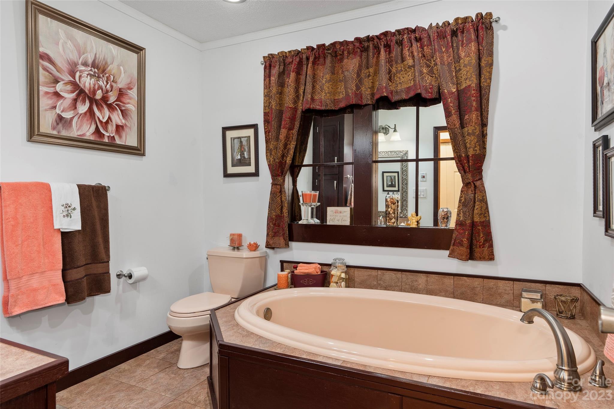 290 Last Mohican Trail Clyde, NC 28721 - Photo 28 of 46 a bathroom with a sink and a bathtub