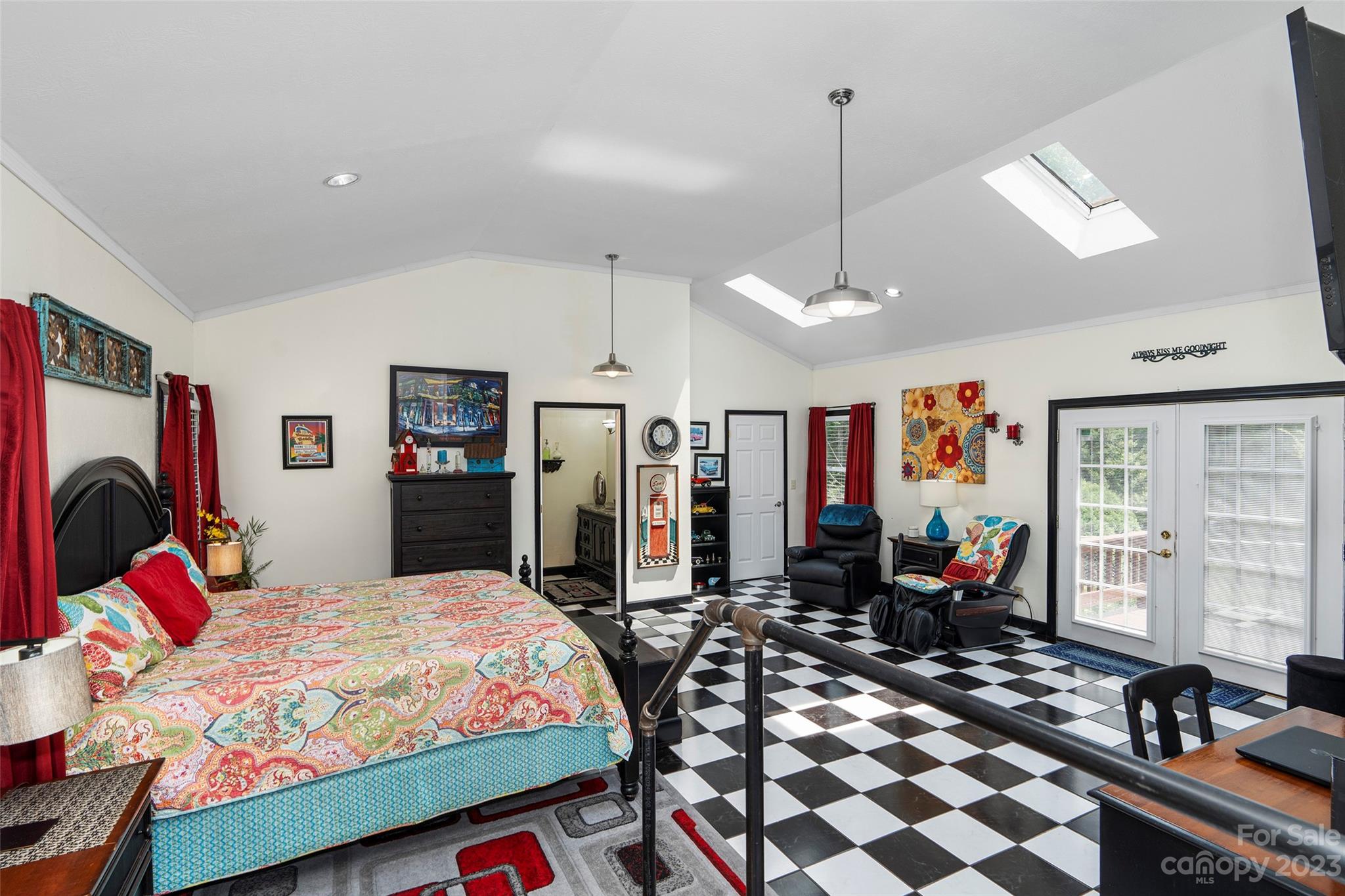 290 Last Mohican Trail Clyde, NC 28721 - Photo 32 of 46 a bed room with a bed a couch and dresser