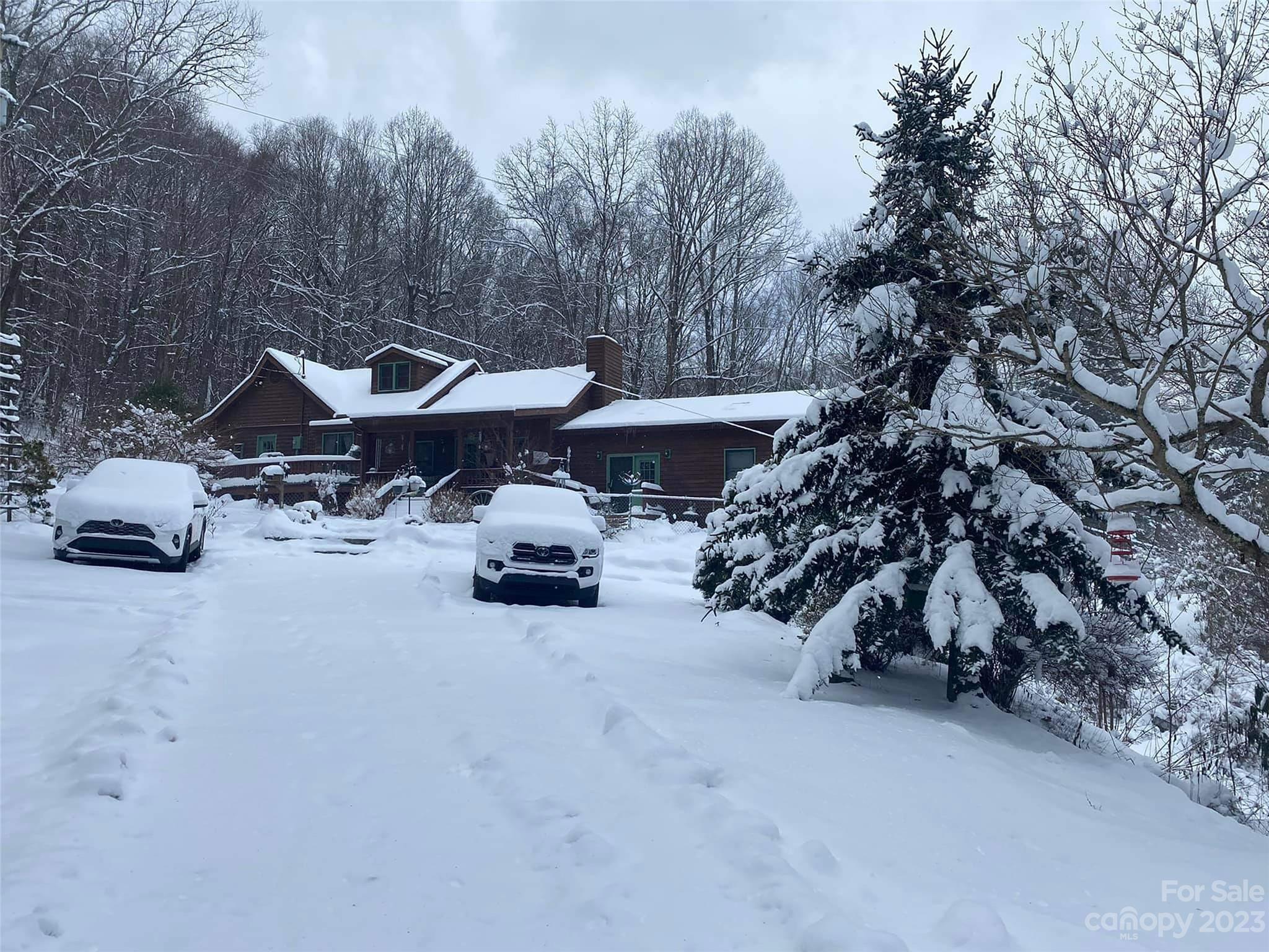 290 Last Mohican Trail Clyde, NC 28721 - Photo 45 of 46 a view of the street with parked cars