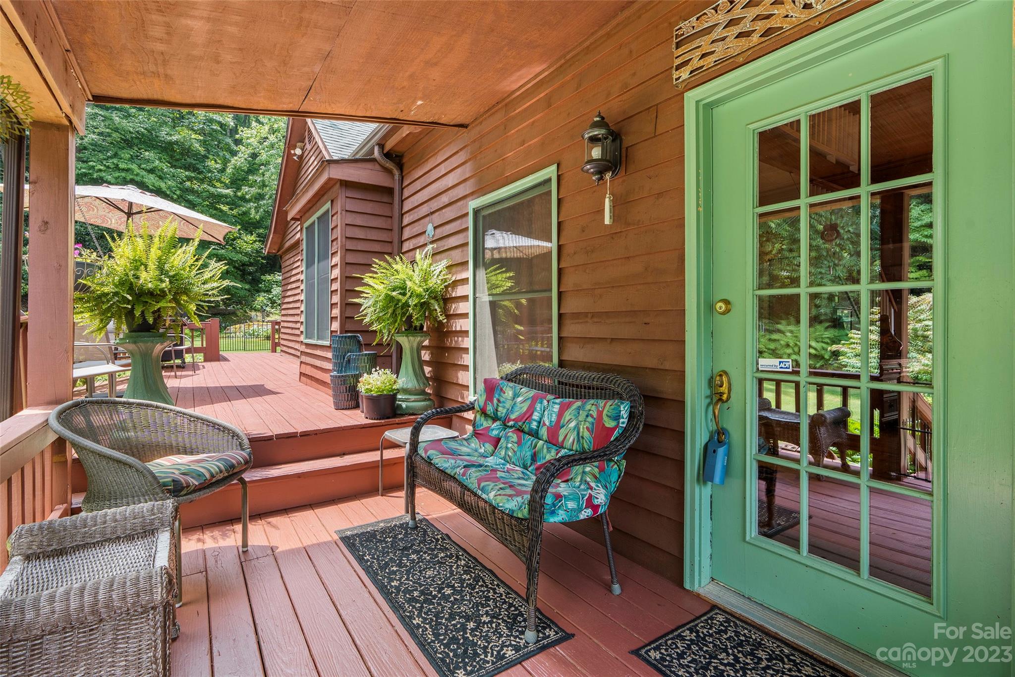 290 Last Mohican Trail Clyde, NC 28721 - Photo 8 of 46 a building outdoor space with patio furniture