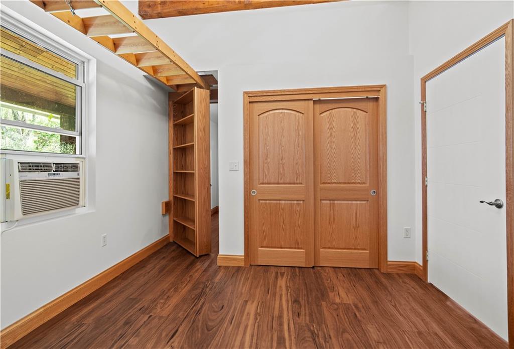 596 Wulfert Road Rochester Mills, PA 15771 - Photo 40 of 49 a view of an empty room with wooden floor and a window