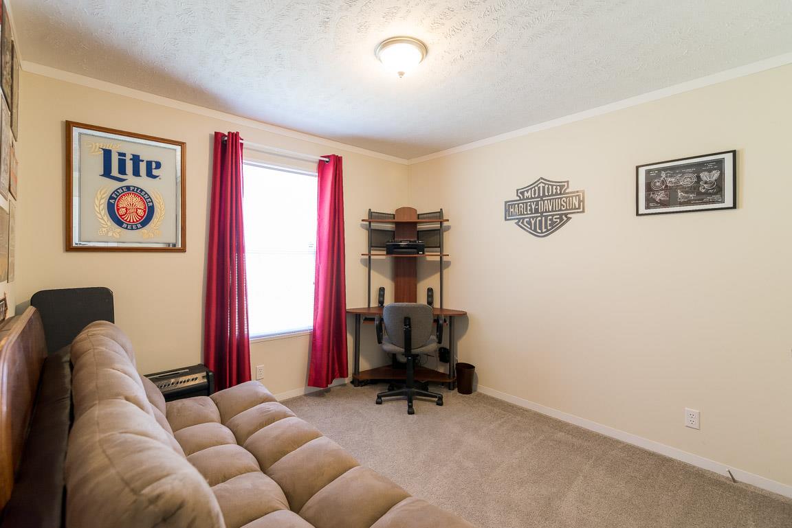 1024 Ben Collier Road Charlotte, TN 37036 - Photo 7 of 24 Bedroom 2 is located on the front left of the home.