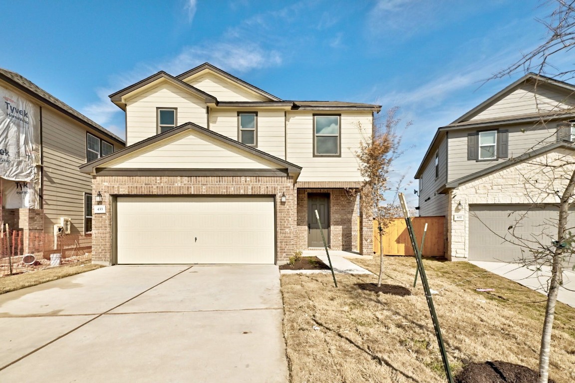 433 Lt. Rusty Jarrell, TX 76537 - Photo 1 of 1 a front view of a house with a garden