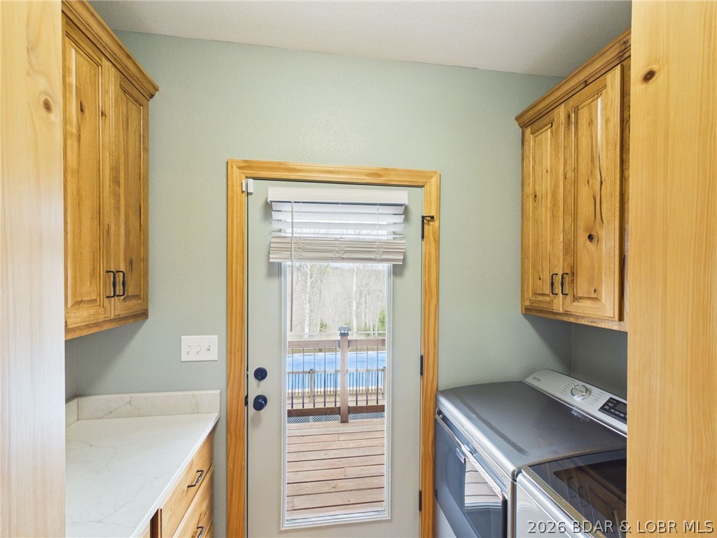 6055 McCasland Road Versailles, MO 65084 - Photo 43 of 99 Laundry area just off the kitchen