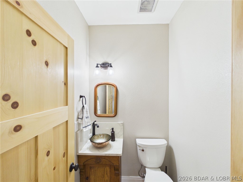 6055 McCasland Road Versailles, MO 65084 - Photo 45 of 99 Main floor half bath