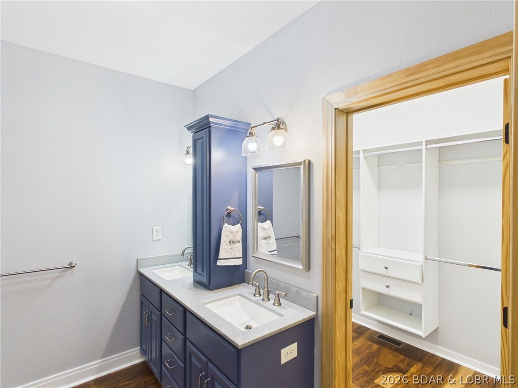 6055 McCasland Road Versailles, MO 65084 - Photo 48 of 99 Primary en suite and walk-in closet