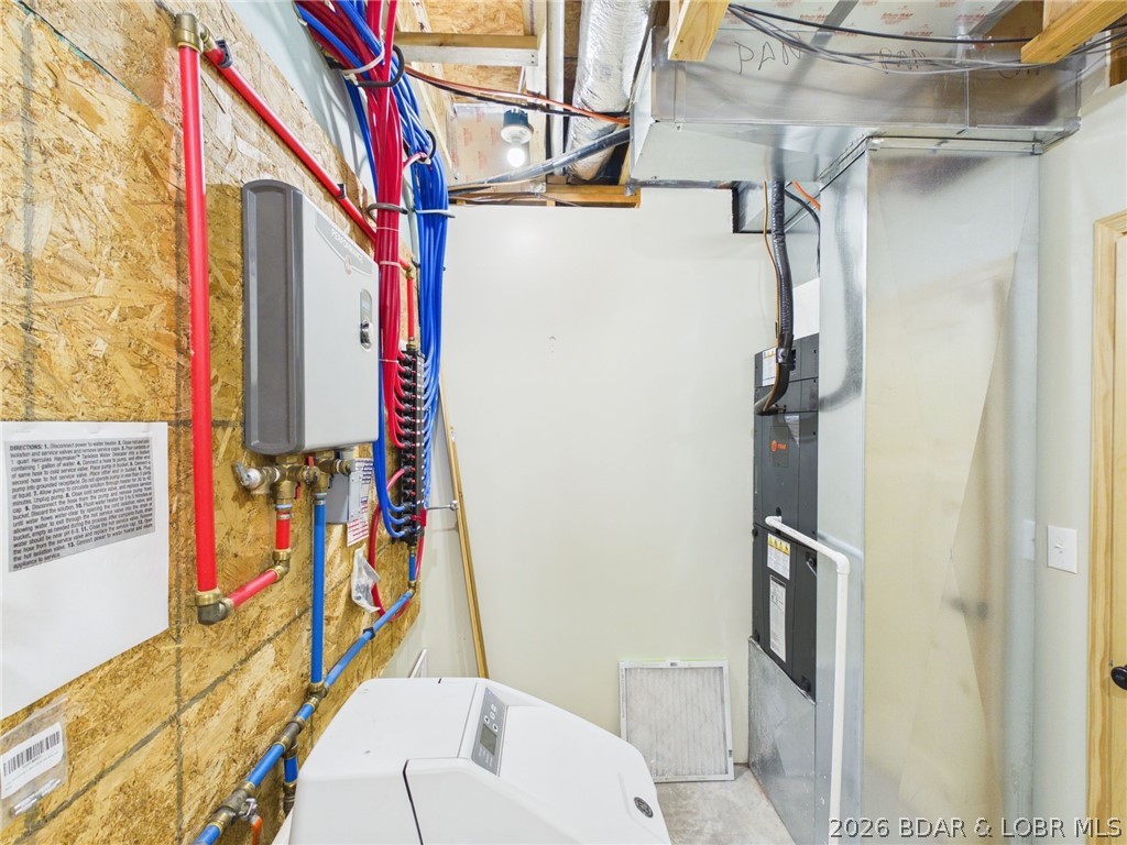6055 McCasland Road Versailles, MO 65084 - Photo 56 of 99 utility/storage room
