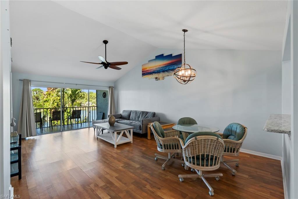 121 Gabriel Circle, Unit 1108 Naples, FL 34104 - Photo 10 of 41 a view of a dining room with furniture window and outside view