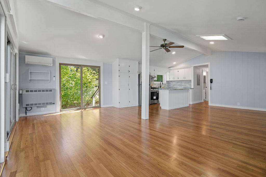 35 Santuit Lane Mashpee, MA 02649 - Photo 28 of 51 an empty room with wooden floor and windows